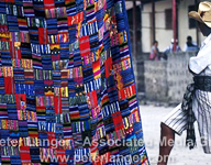 guatemalan man selling blanket