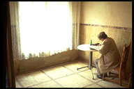 romanian man in a cafe